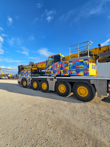 Manitowoc: Nimble Crane to shine light on Autism Awareness Month with vibrant crane wrap